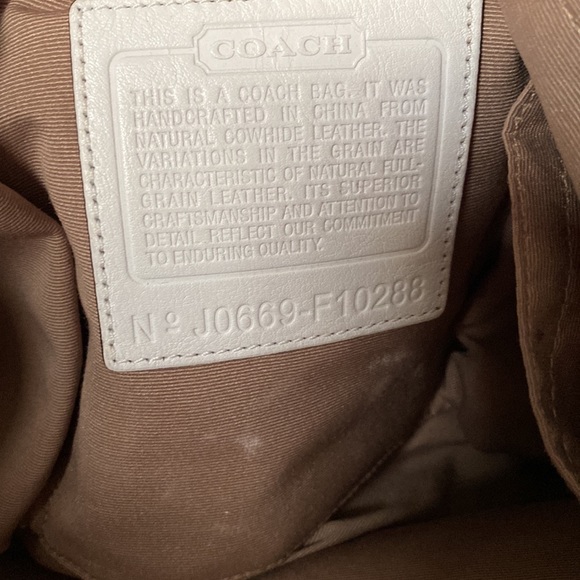 Coach creamy/white color leather diaper bag with 2 changing pads - Picture 9 of 15